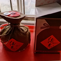 两瓶90年的古井贡酒及一瓶郎酒处理