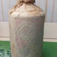 一瓶1982年及一瓶01年茅台酒处理